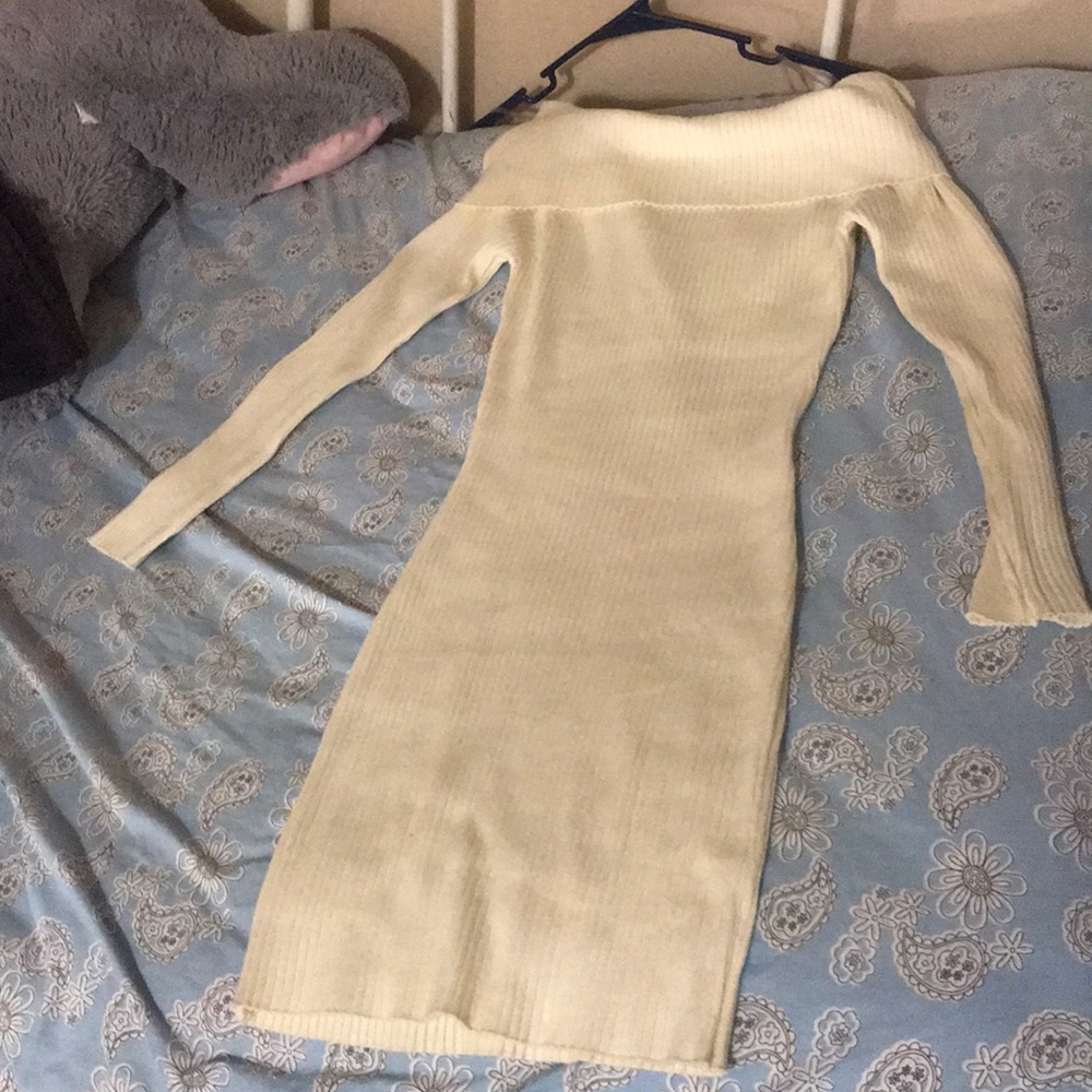 Knee length ribbed dress that is off the shoulder.